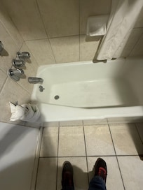 Bathtub did not look clean.