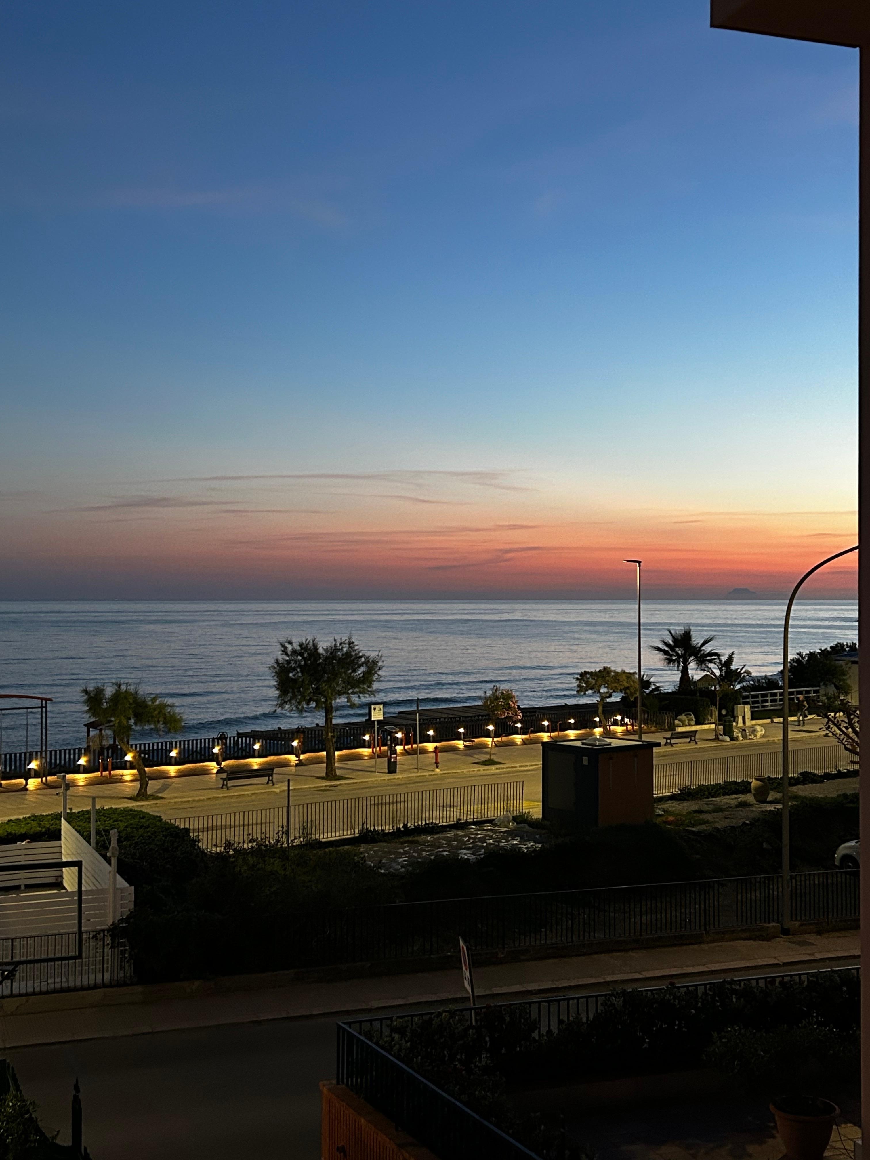 Sunrise view from the balcony of my hotel room 