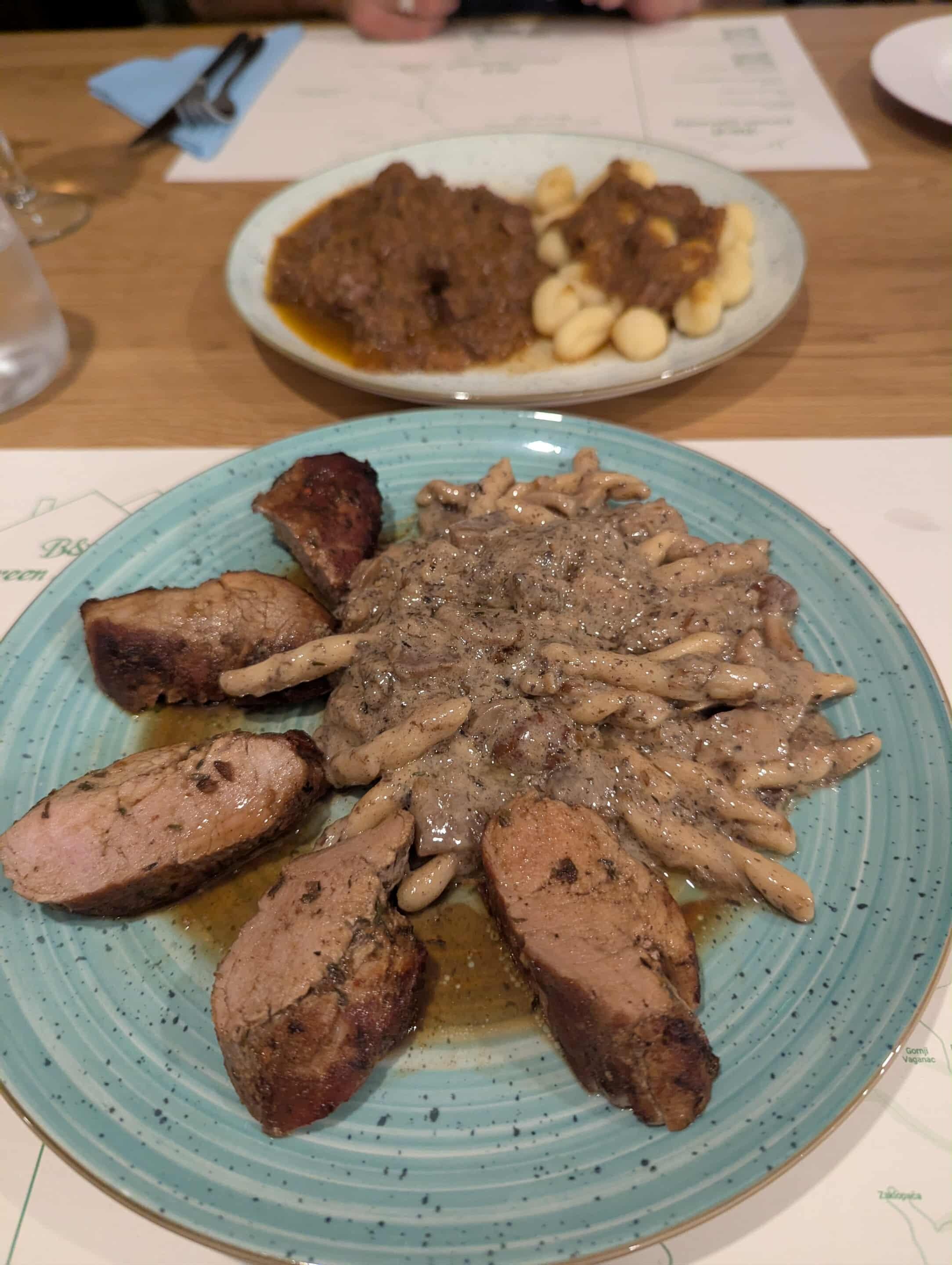 Pork tenderloin in mushroom truffle sauce and wild boar stew. Delicious!