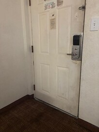 Room is dirty and unclean. Look at the door