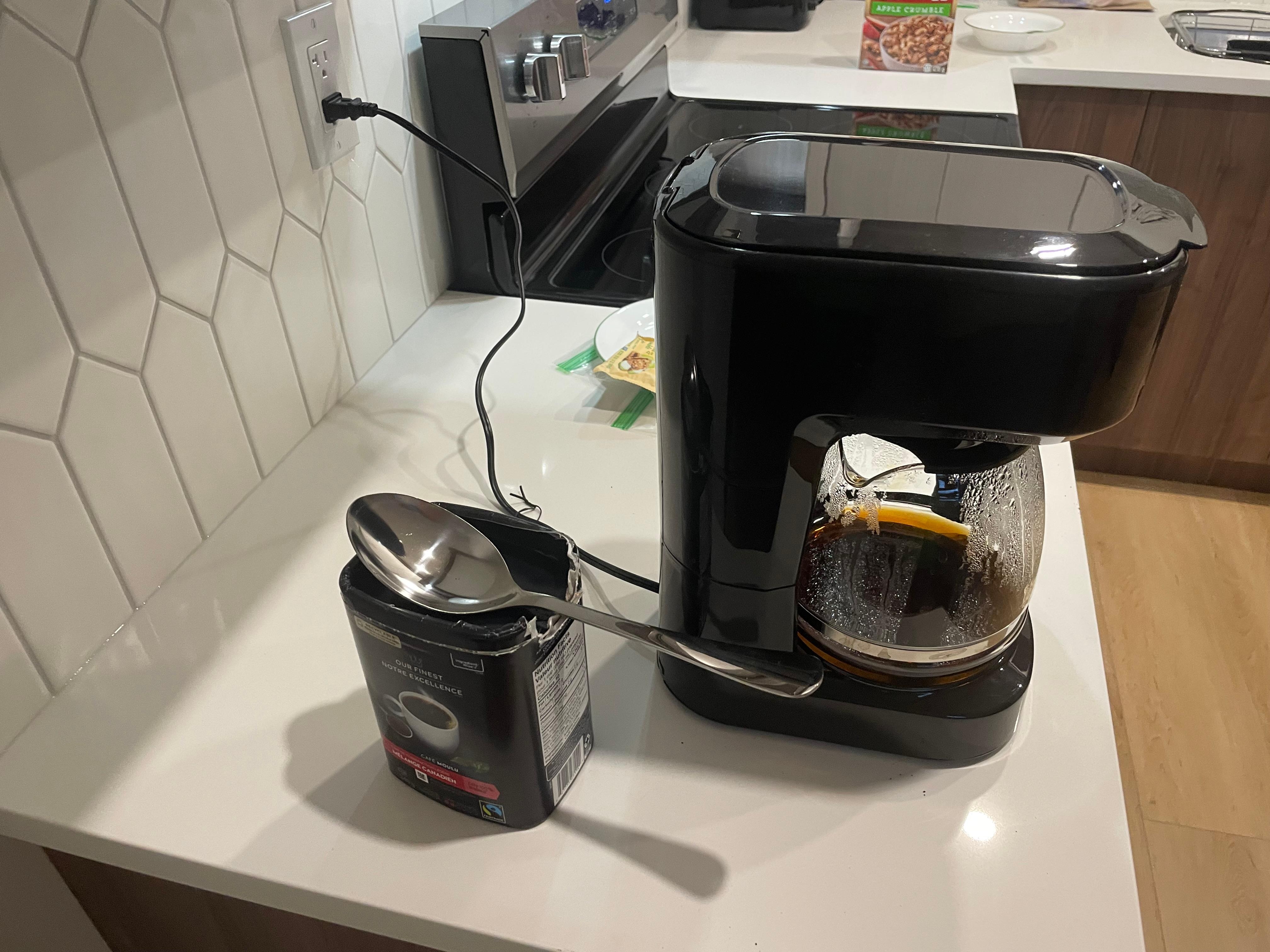 No coffee scoop or regular spoons. Made do with giant serving spoons