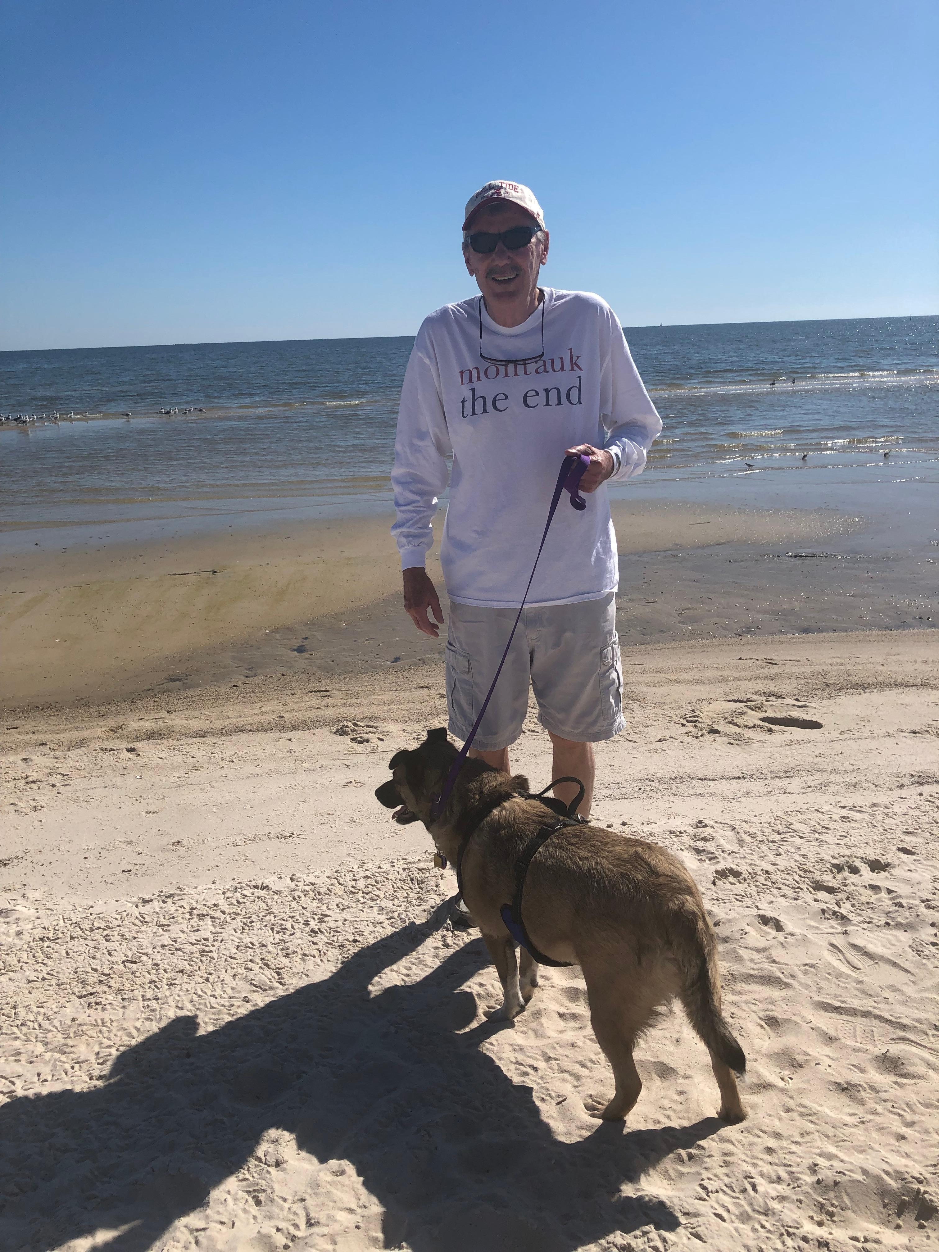Bay St. Louis beach welcomes your pet but on a leash. Our Bandit loved the beach. We adopted him a year ago. 