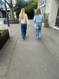 Walking beside the hotel towards the next photo