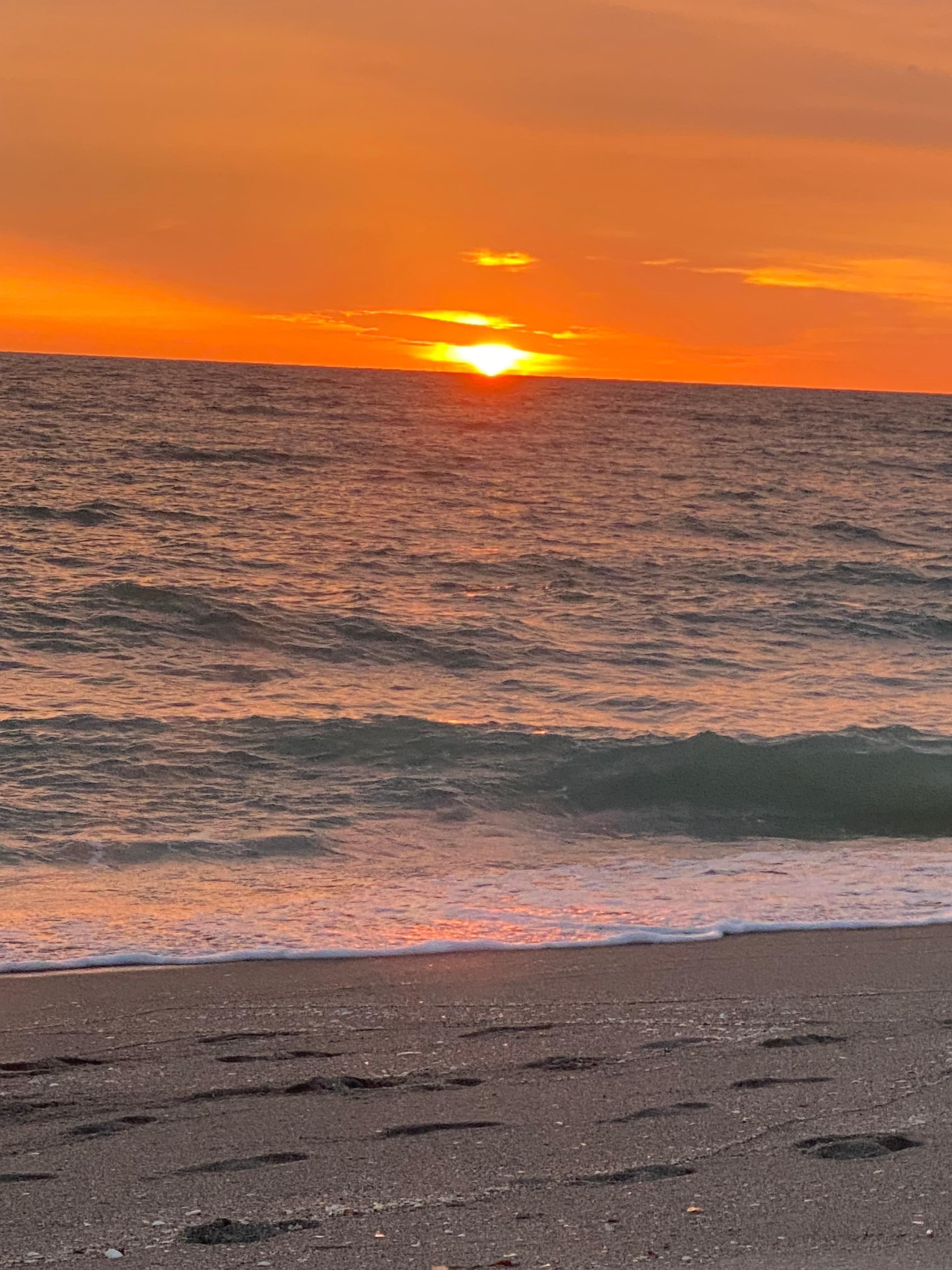 Sunset on the beach. So easy to walk over to view it nightly.