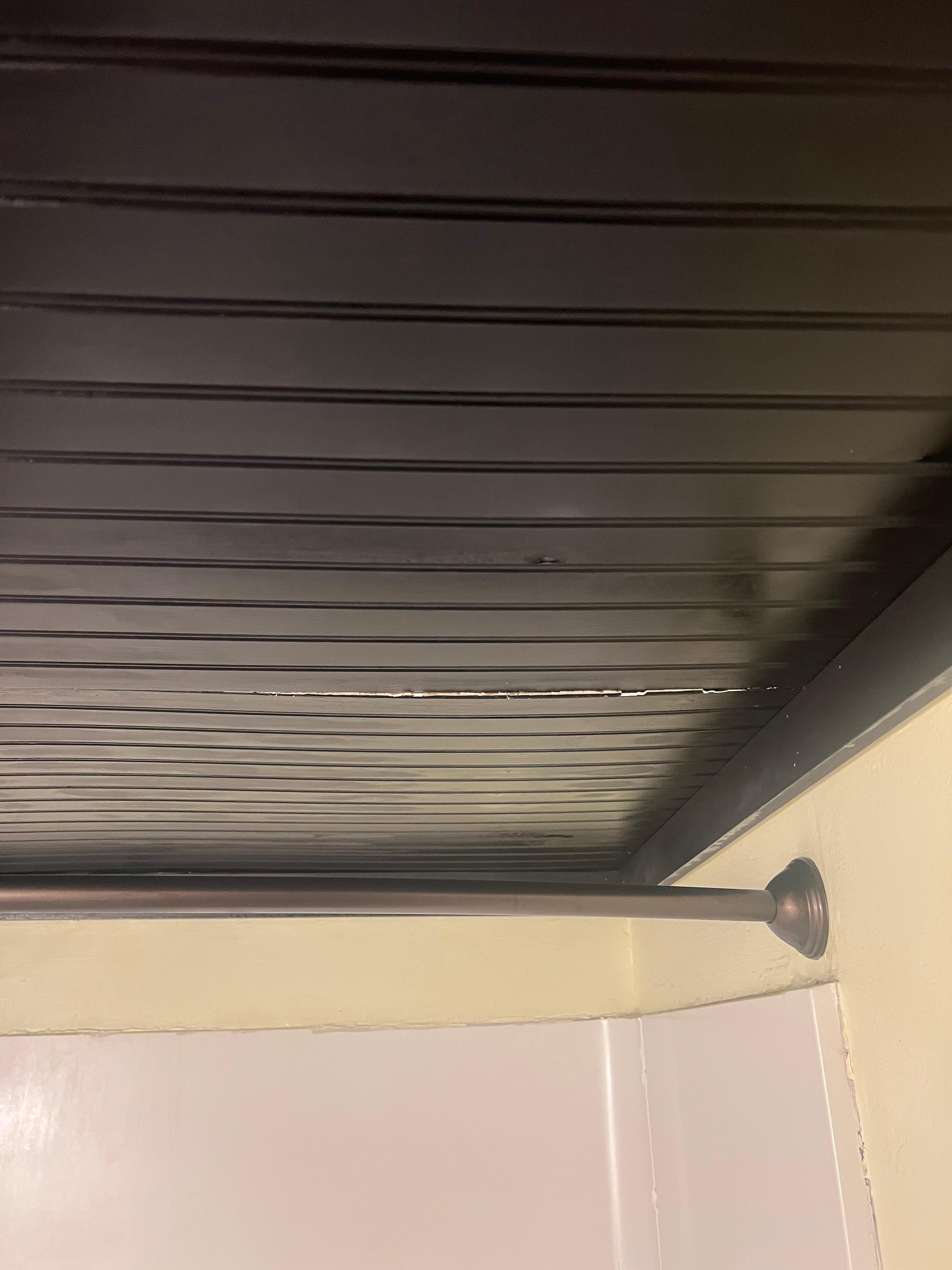 Remaining ceiling cracked and bowing in downstairs bathroom as well.  Very unstable. 