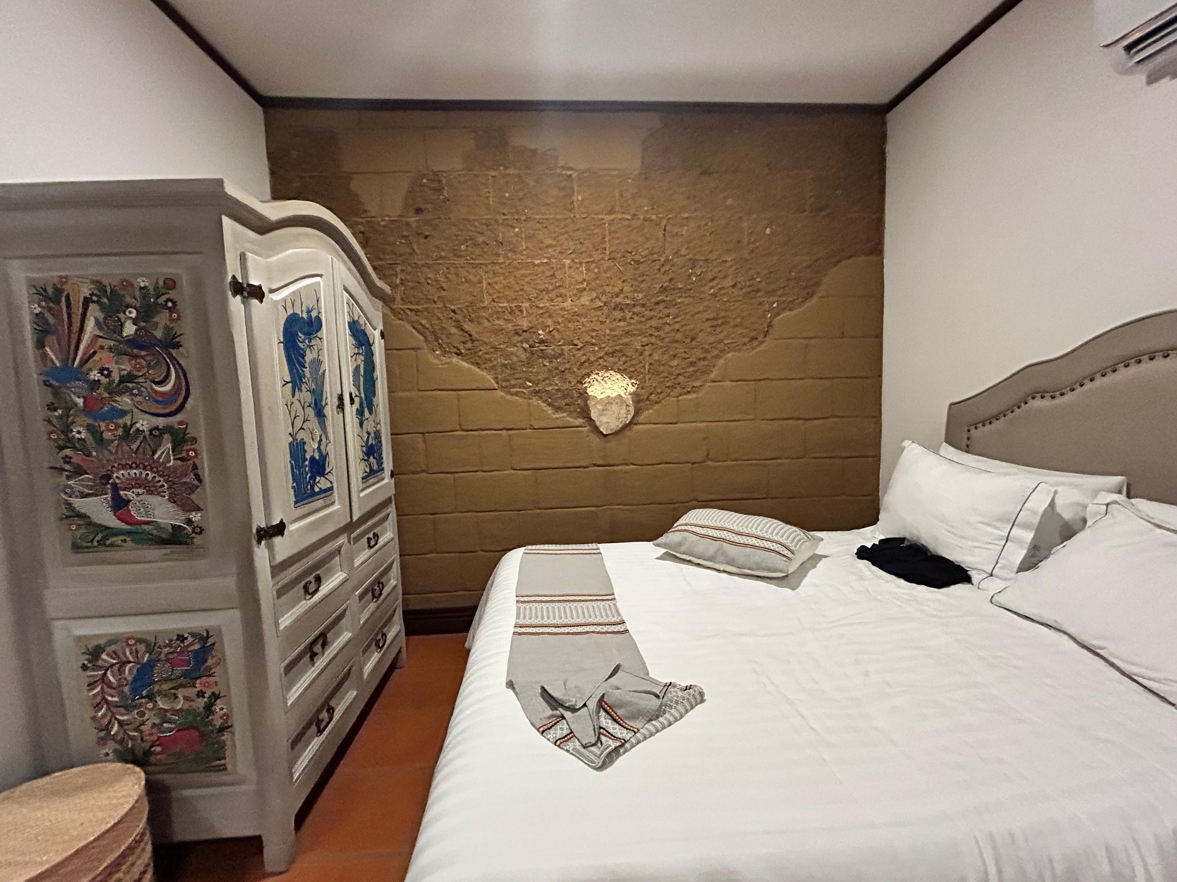 Casa de Adobe- maybe half of the room. Love the way the light is built into the wall!