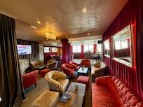 Lobby/bar/pool table. Free coffee, tea,donuts and a fruit daily