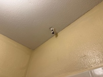 A/C condensate drain dripping into the shower and onto the head splattering on you!