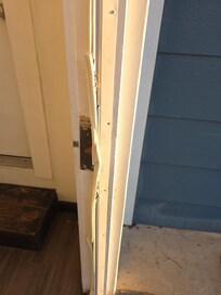 This is their way of fixing the weather stripping on the back door.