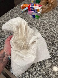 After wiping the kitchen table down