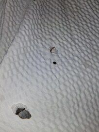Burn holes