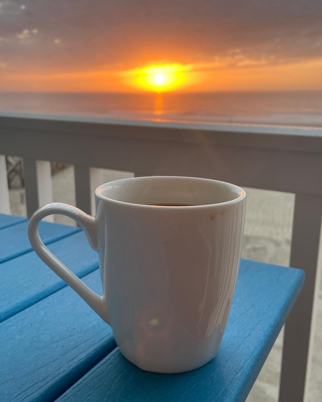 Morning sunrise from the deck with coffee. 