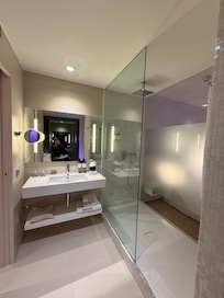 washroom with shower booth
