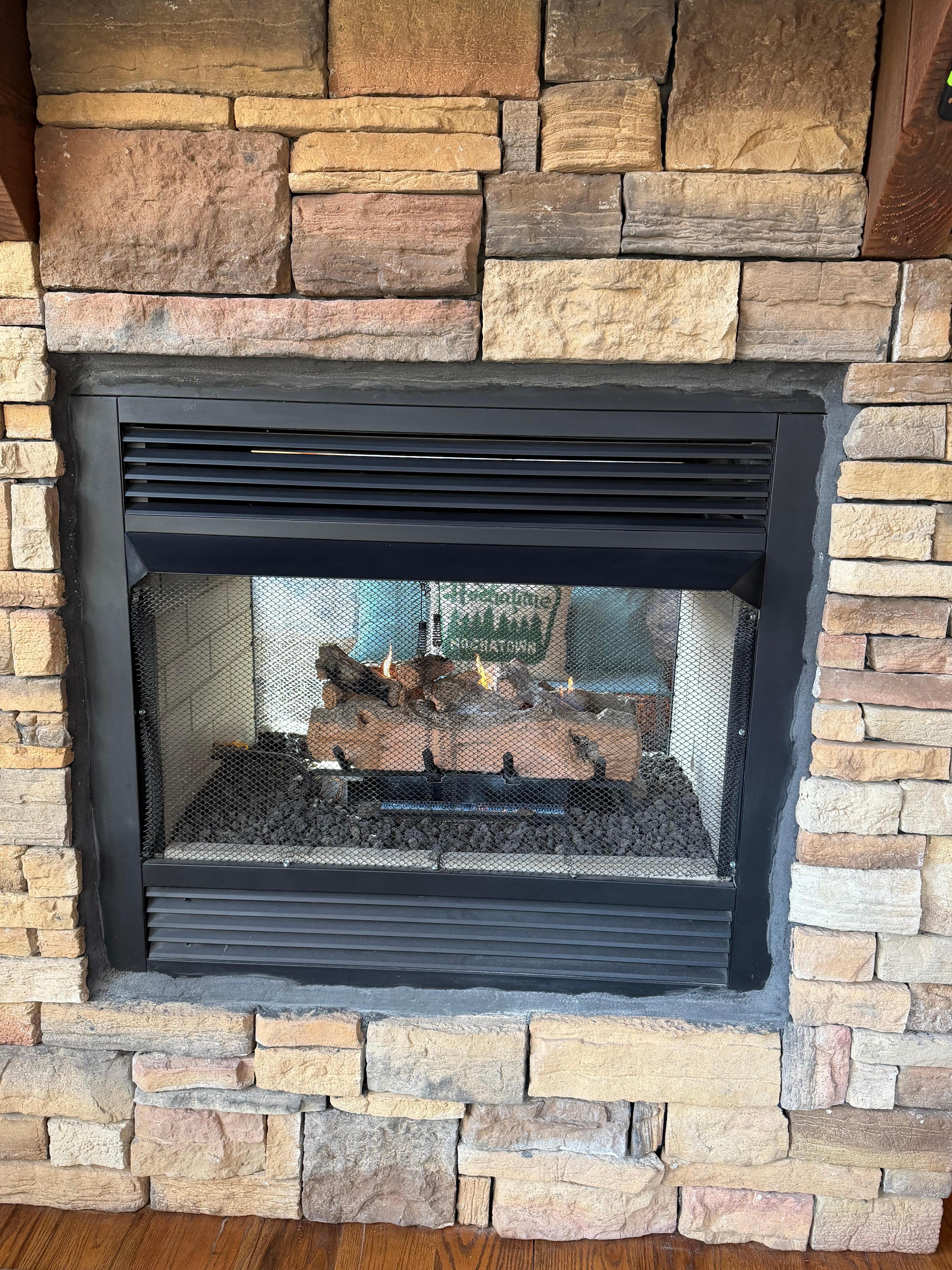 Dual sided fireplace