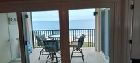 Living room view of the balcony and most important, the ocean