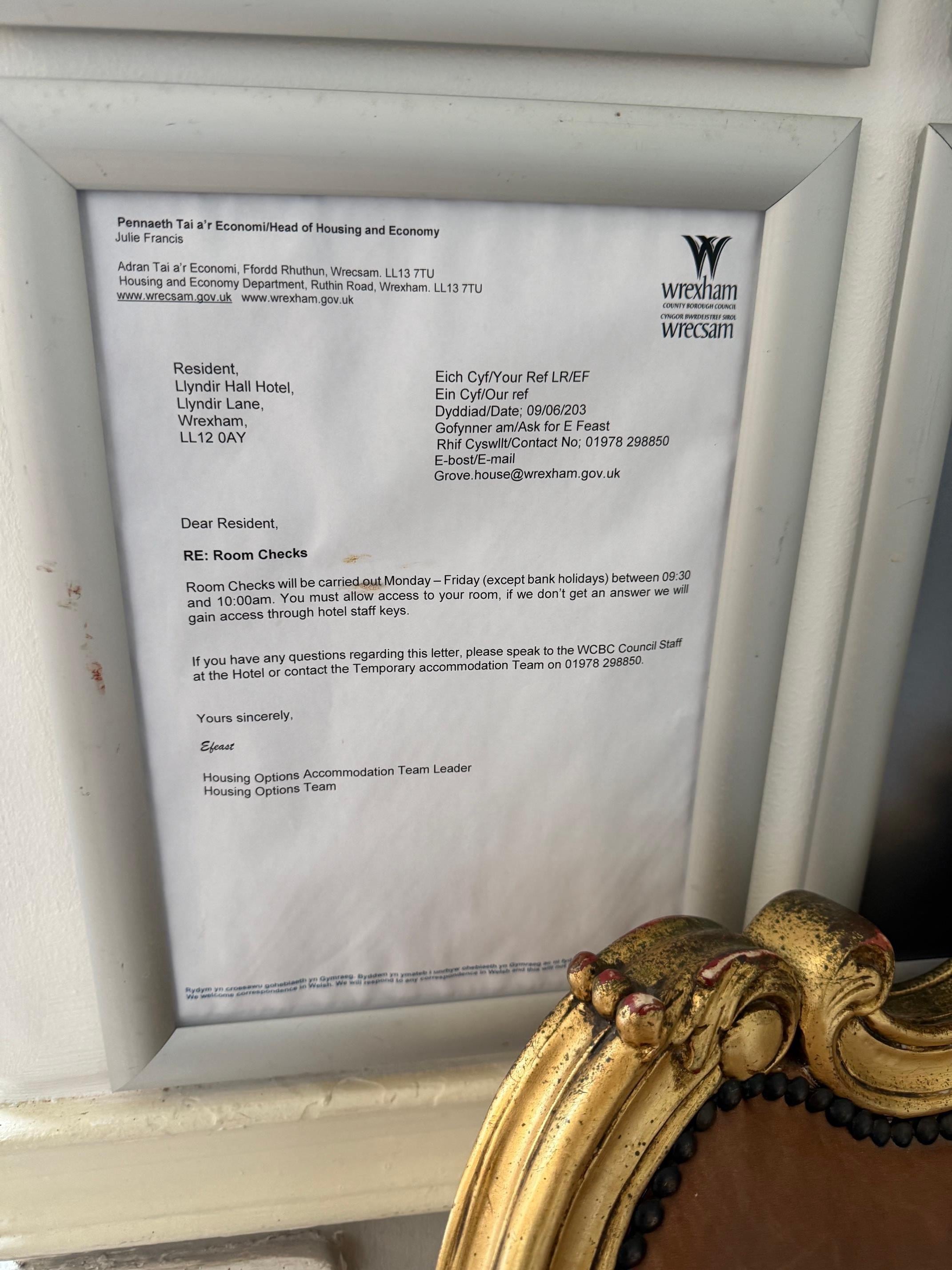 A letter on the wall in reception saying that all rooms would be inspected 