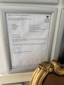 A letter on the wall in reception saying that all rooms would be inspected