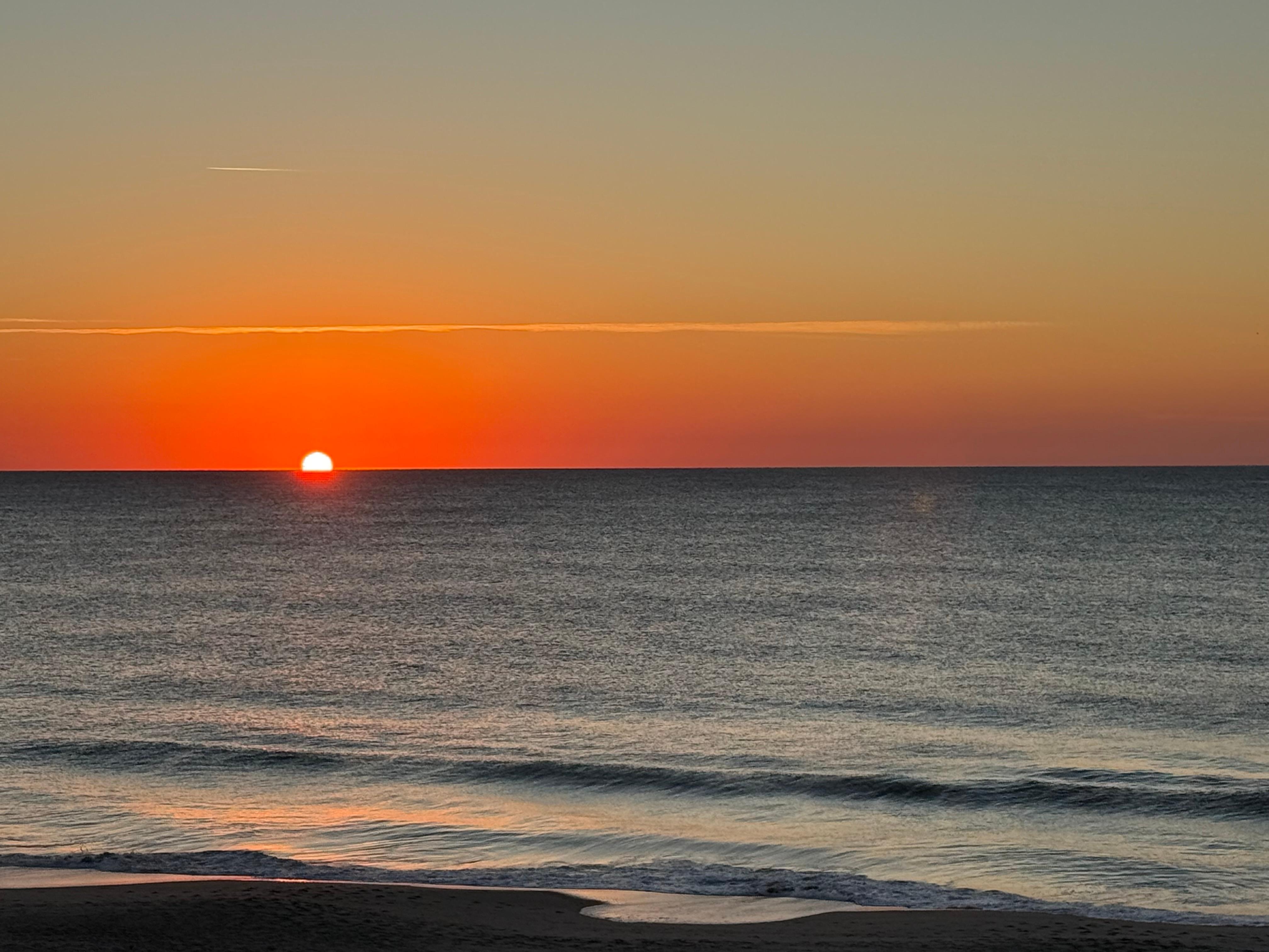 Sunrise from the balcony, Living room and Msster bedroom 