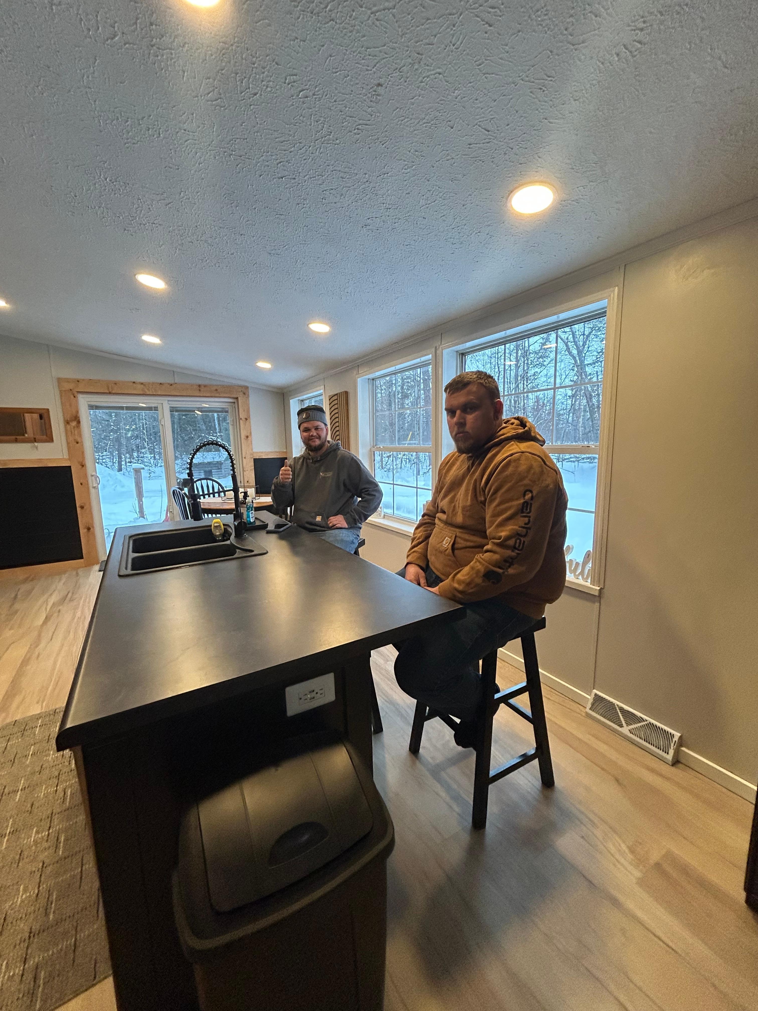 The boys enjoyed sitting at the island!