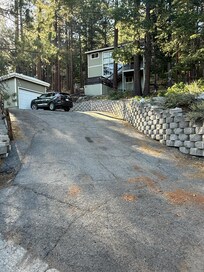 Steep driveway can really only fit 2 cars safely and hard to get out
