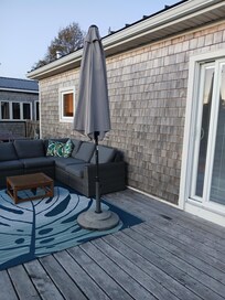 Outdoor dining is just steps away on balcony...