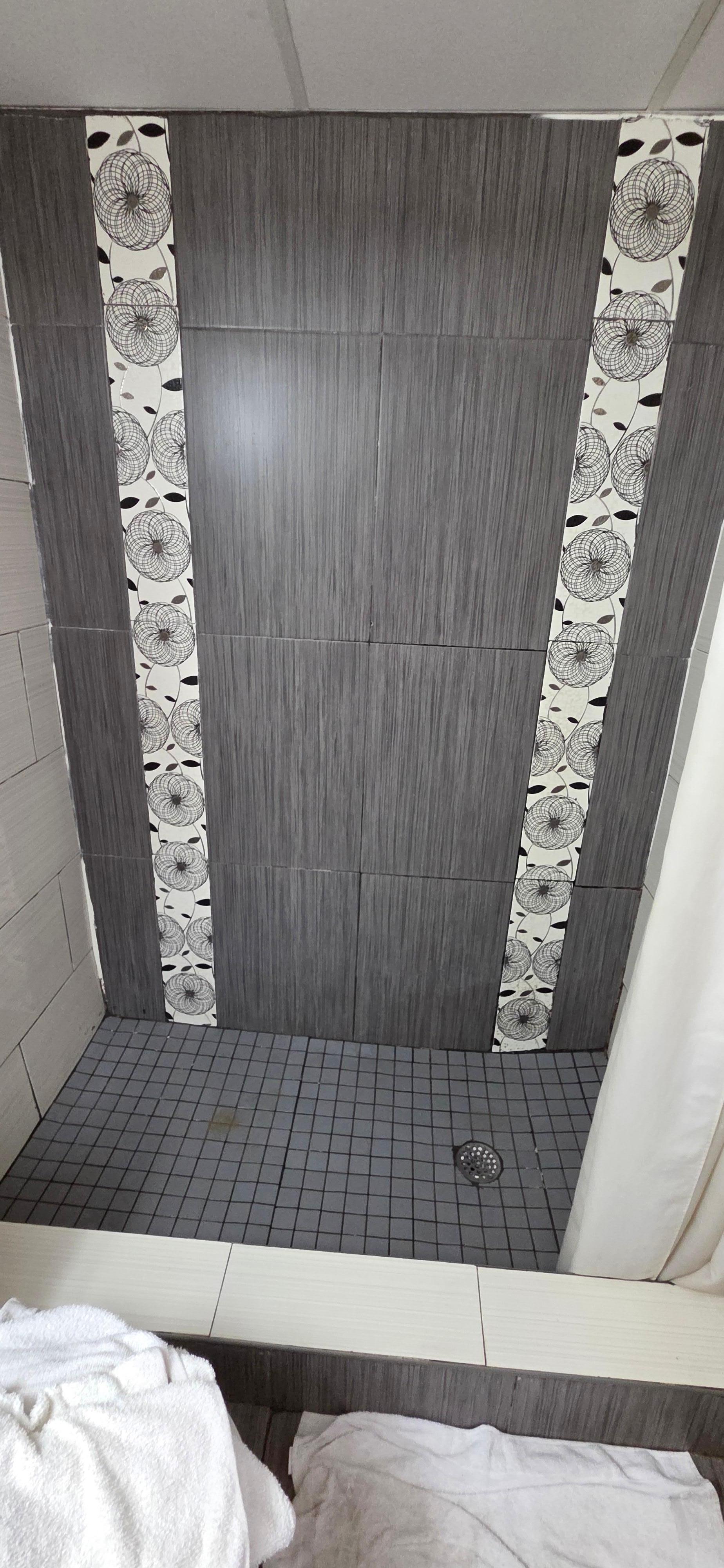 Shower dirty and chalked everywhere 