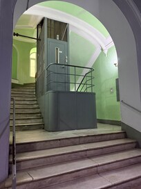 The elevator is very narrow and requires a coin when the building concierge is there, but worked well.