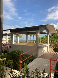 View from the room- communal deck/patio, ocean and landscape