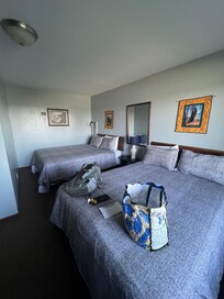 Room7 with 2 queen beds. Great water pressure. Fridge, microwave and coffee pot