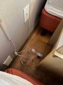 Bed light is unplugged because the outlet is unsafe