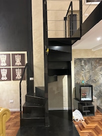 Steps up to bedroom and bathroom