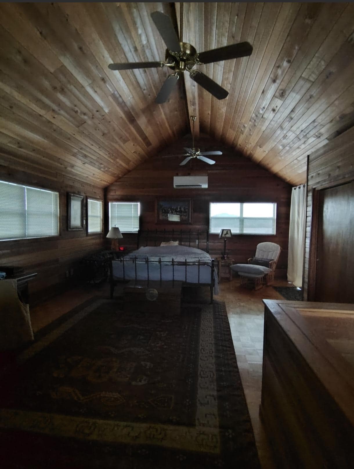 Roomy, cozy, comfortable bedding, beautiful wood walls and ceiling! Lots of natural light and a cozy balcony attached. Restful through and through. 