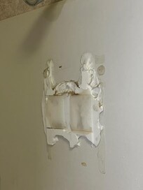 This was in the shower. Apparently they must have had a shampoo/soap dispenser that was removed. This is how they left it. Unacceptable even by the lowest of standards.