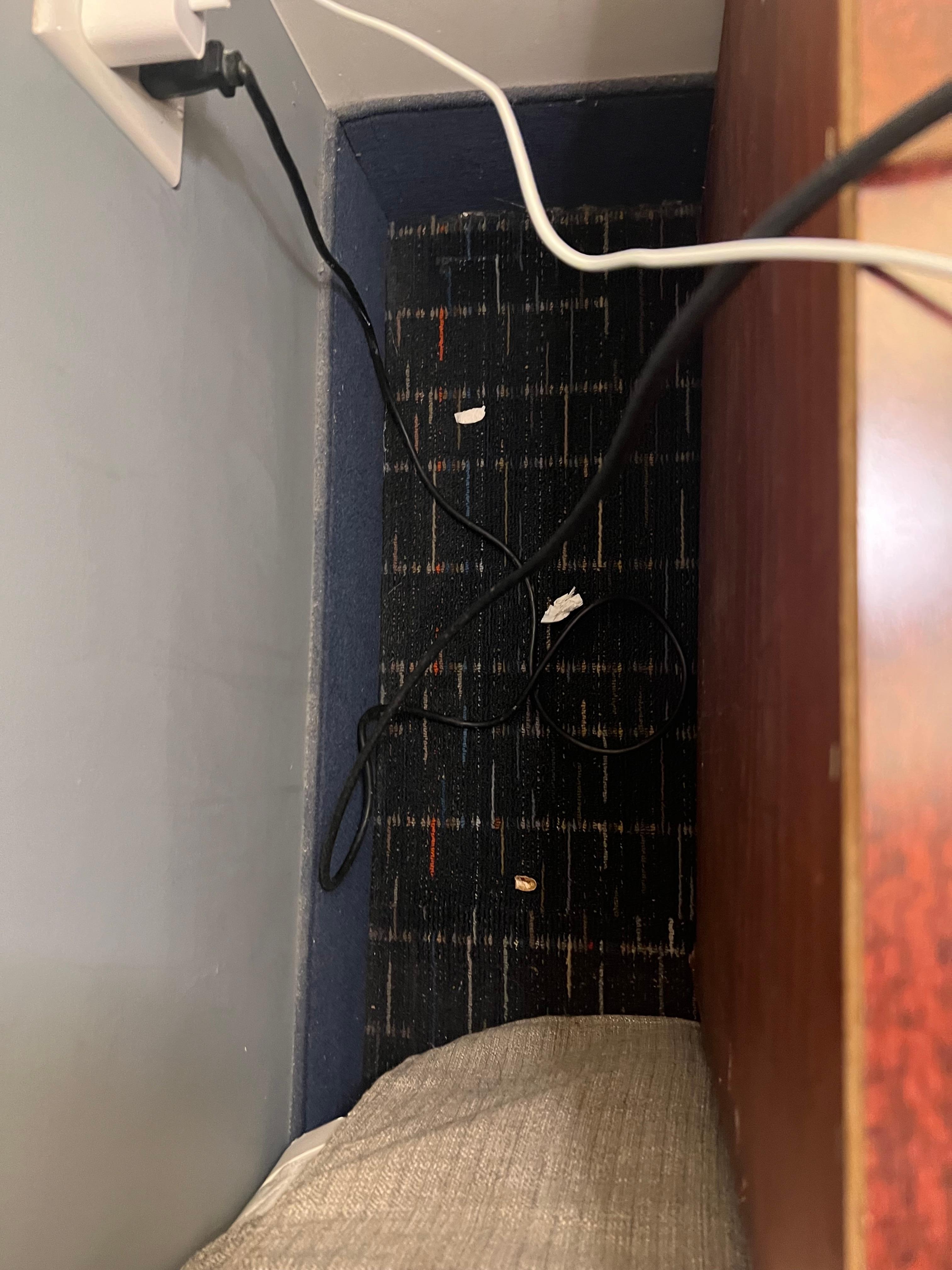 For the most part the room was clean. Room was spacious and comfortable. Pulled out the side table to plug my phone in and there was a bit of a mess behind the table.