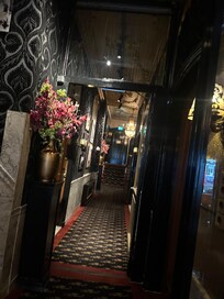 Entry way to the hotel, hallway to the lift