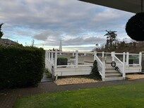 Shared patio with plenty of outdoor furniture.
