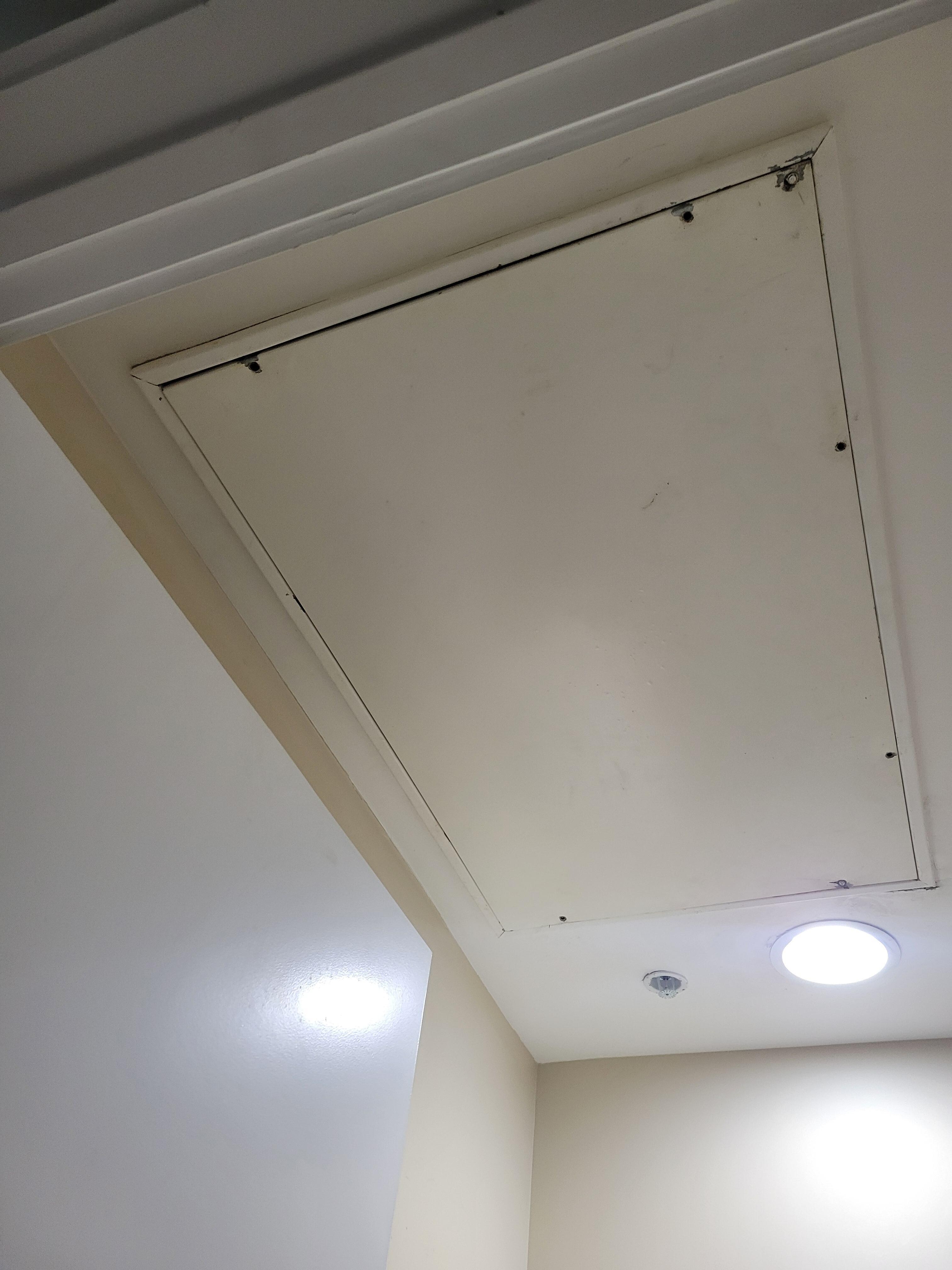 stream of water from ceiling panel 