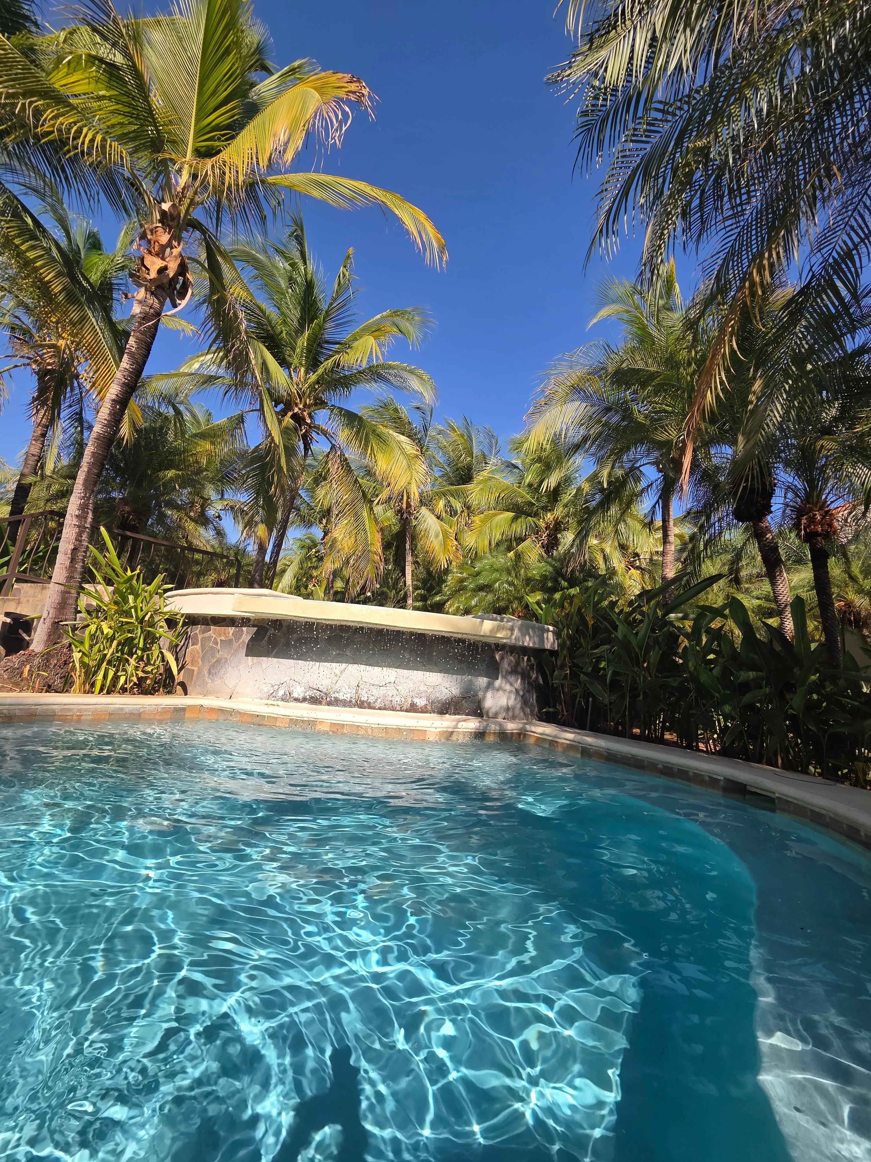 Hot tub and pool entrance right in front of the patio.