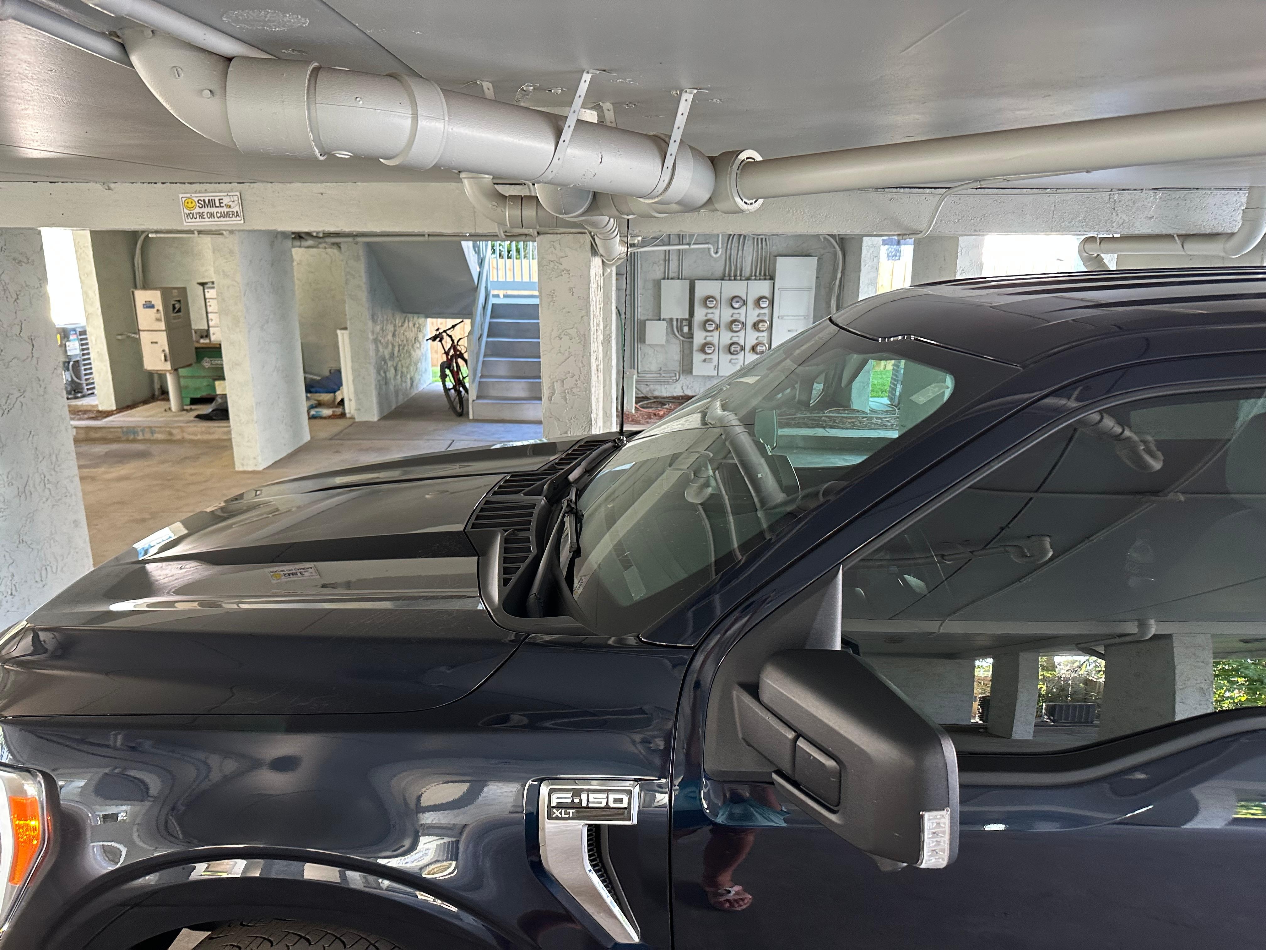 Ceiling was so low in the parking area under the condos that my truck's antenna hit the ceiling PLUS it was impossible to park in the very small parking space surrounded by columns