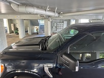 Ceiling was so low in the parking area under the condos that my truck's antenna hit the ceiling PLUS it was impossible to park in the very small parking space surrounded by columns