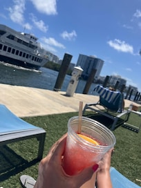 Sitting on lounge chair by water was beautiful