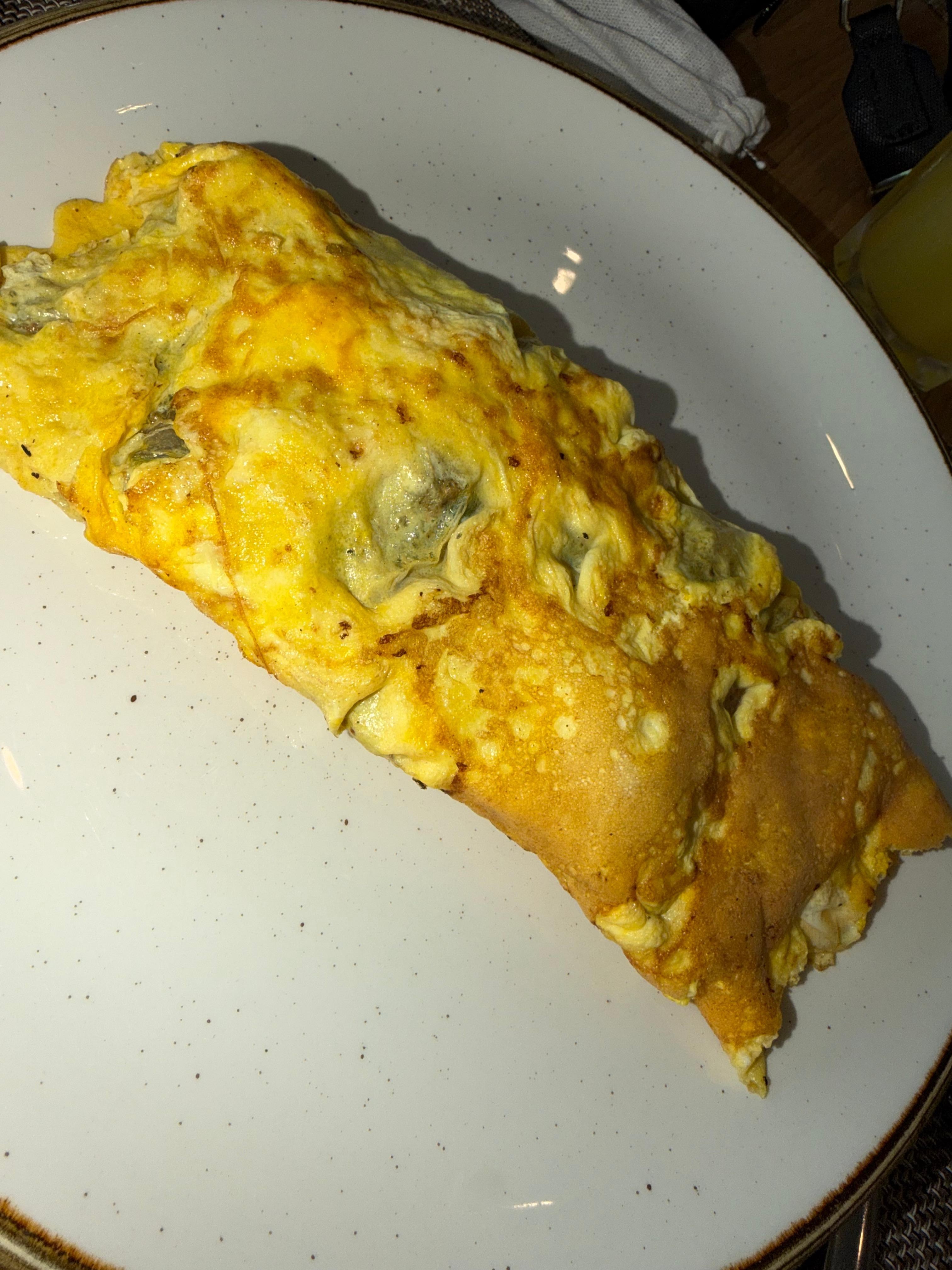 Fresh made omelette, catering to my allergies