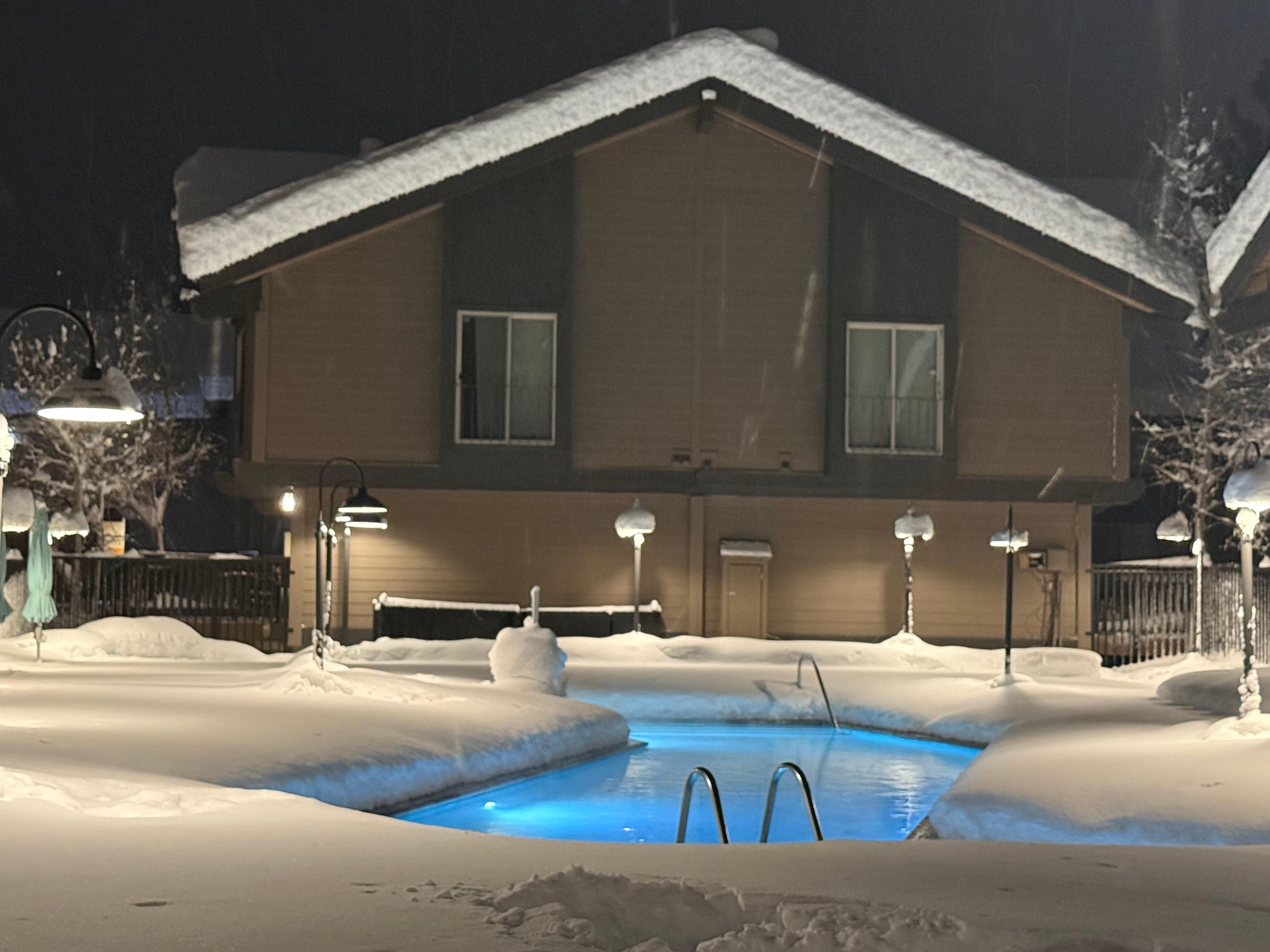 Pool at night after it snowed 