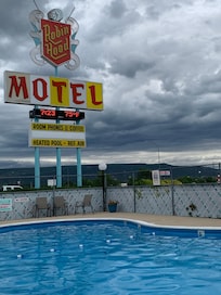 The pool and vintage neon sign