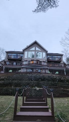 View from the lake of the house.