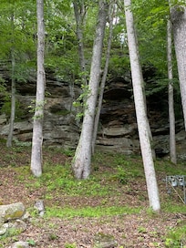 This might be the rock/cliff behind the house.