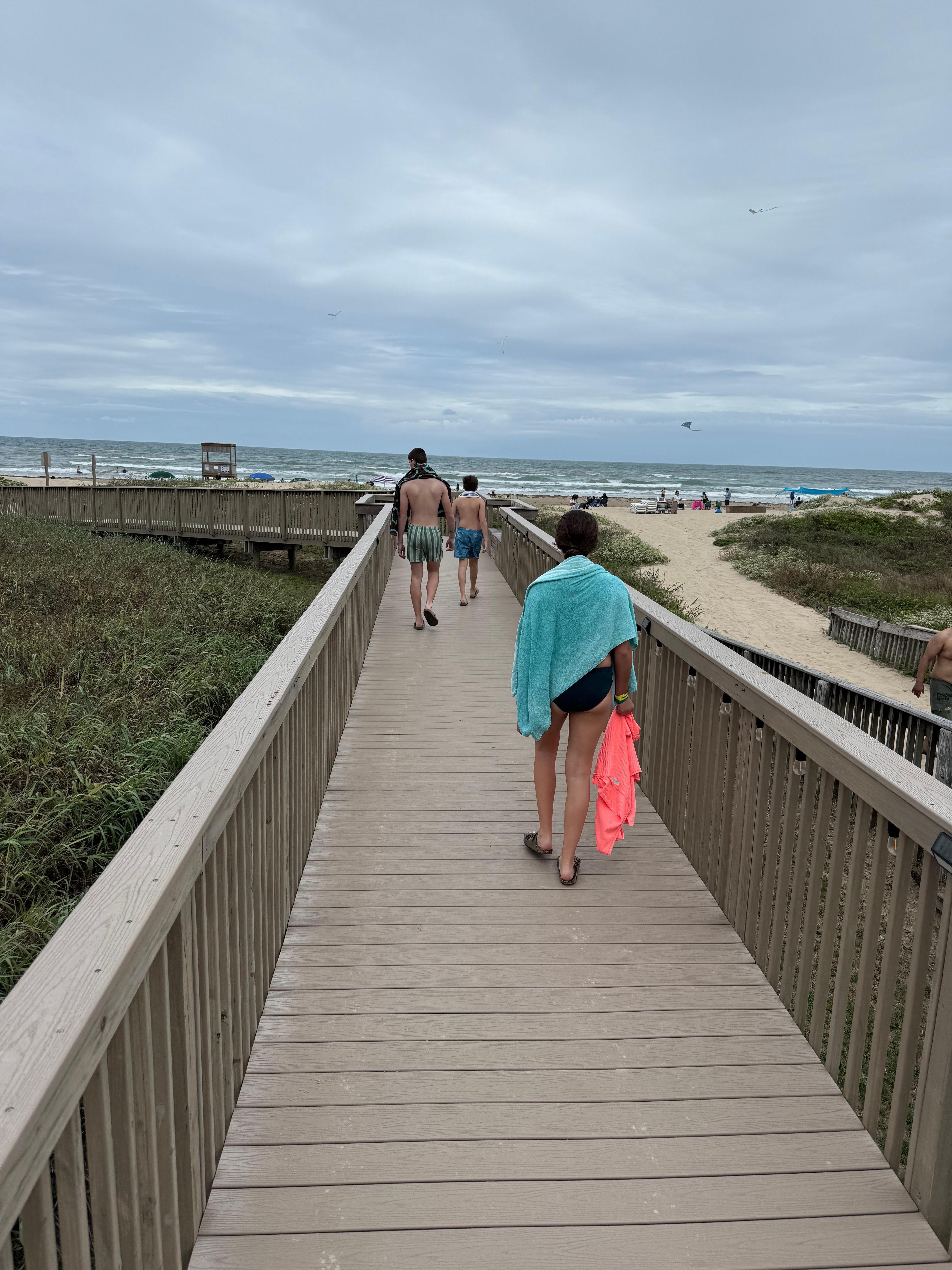 Short boardwalk from the pool to the beach 