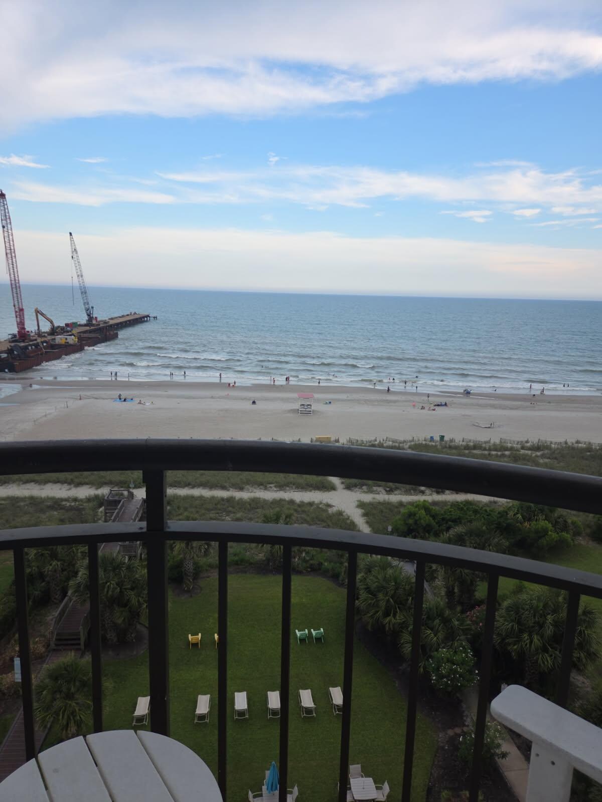 Balcony view, nice rocking chairs that are very comfortable 