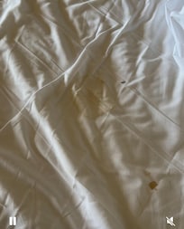 BLOOD FROM PREVIOUS OCCUPANT OF THE ROOM UPON ARRIVAL