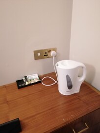 Stale water in the kettle, no cups provided and no sugar.